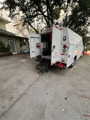 Magnet Plumbing service vehicle on-site for Grease Trap Cleaning in Ramirez Estates